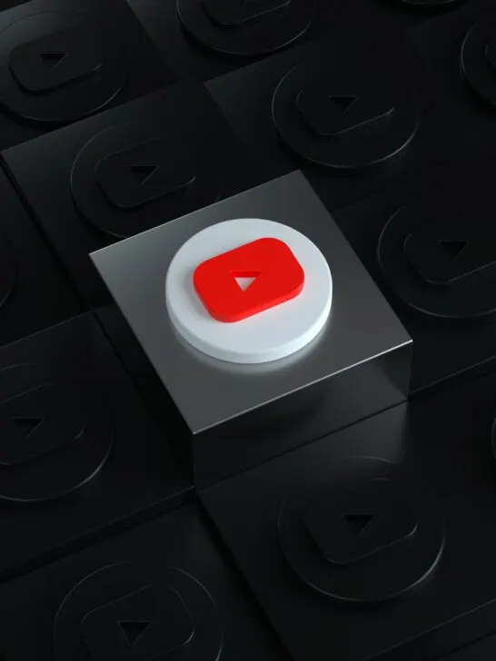 3D YouTube logo with dark background.
