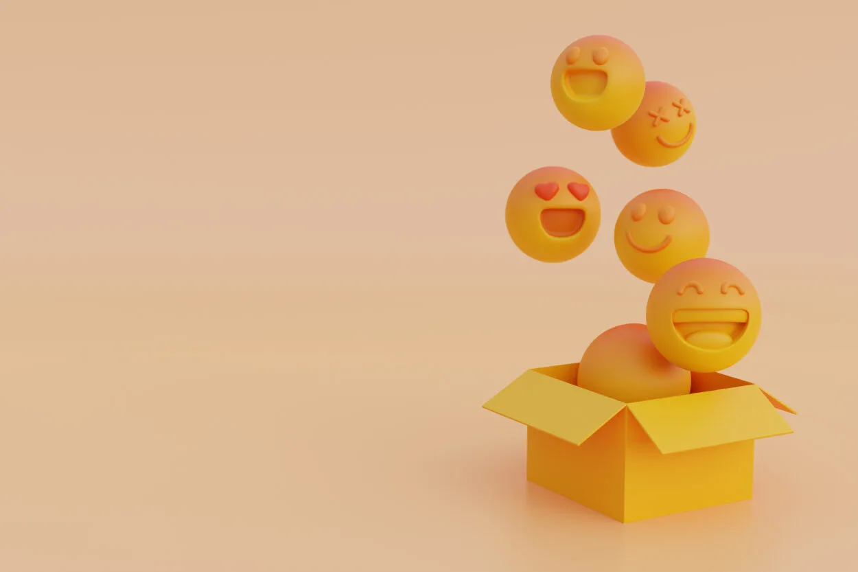 Emojis emerging from a box