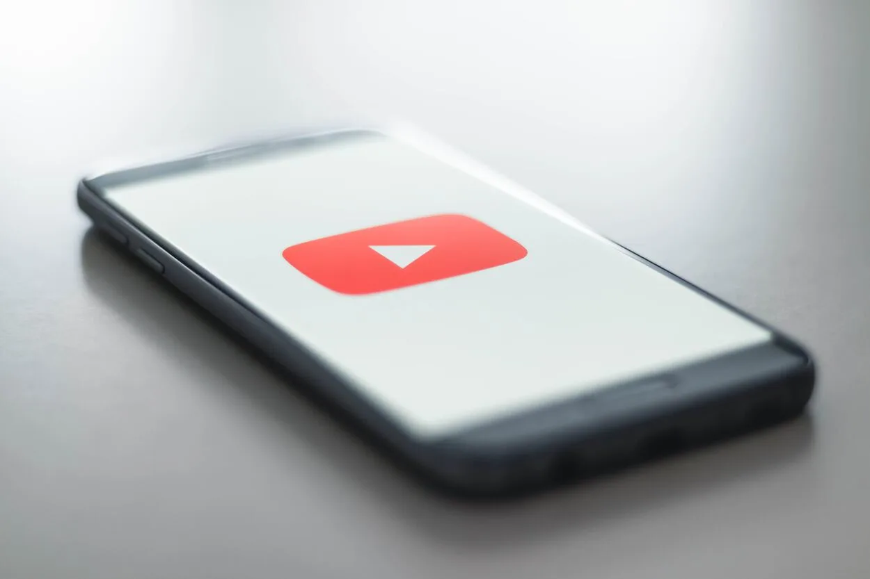 The YouTube logo on a phone screen