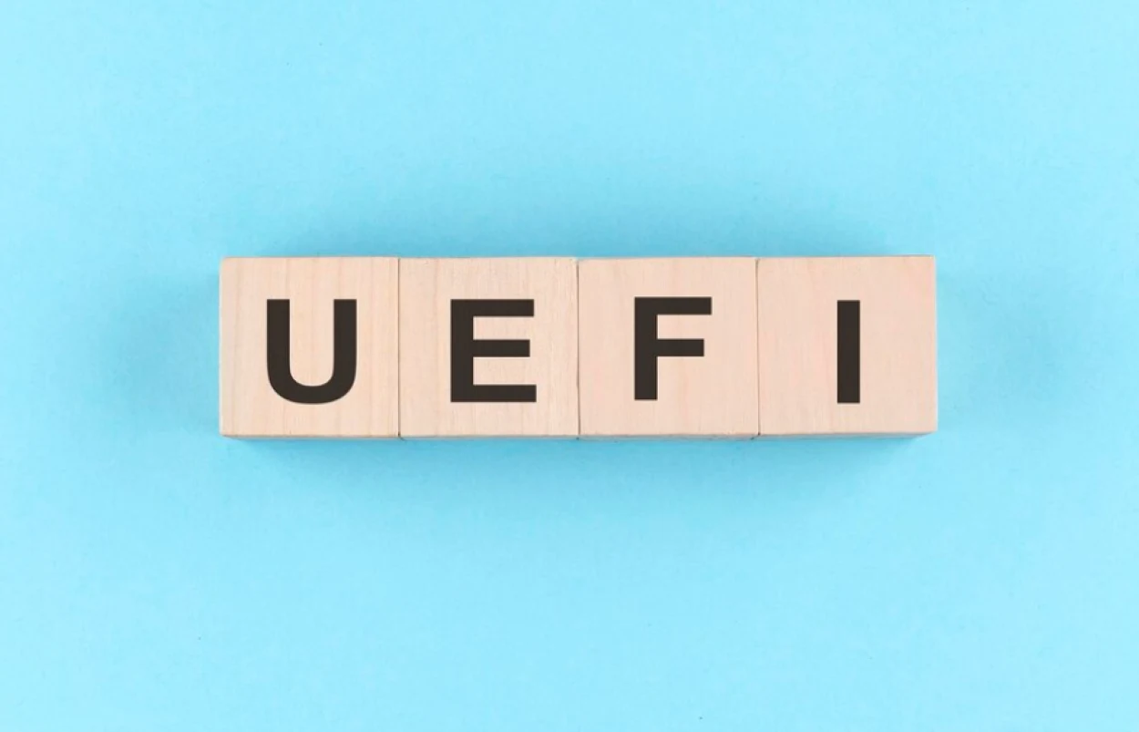 UEFI wooden letters written on blue background.