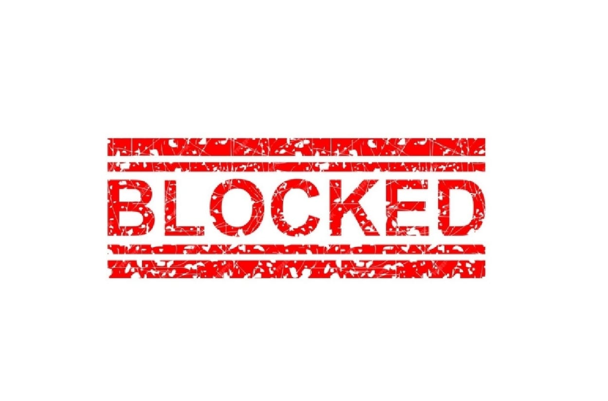 Blocked written in red on a white background